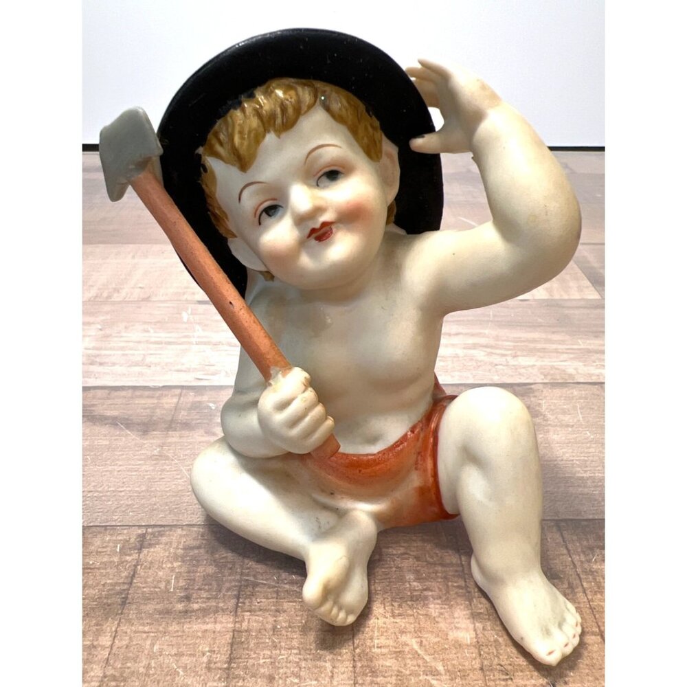 Vintage Ceramic Figurine Of Boy With Axe & Black Hat